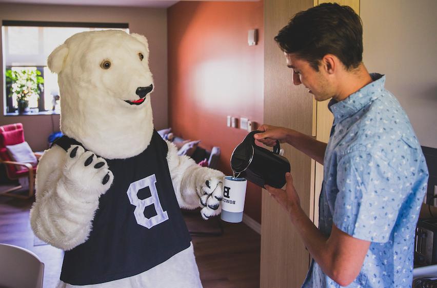 Polar Bear mascot sharing some tea